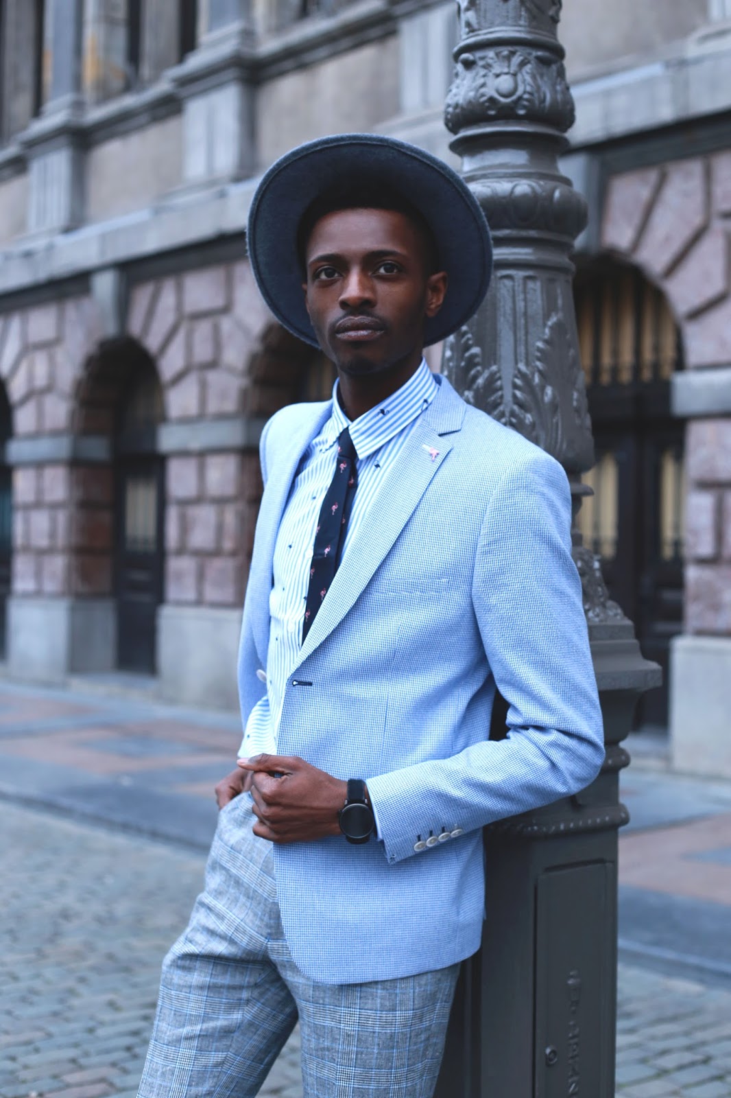 Business Chic men's look we fashion + adidas nmd sneakers // suits and sneakers - street style antwerp by jonthegold - photo by sofia dossantos