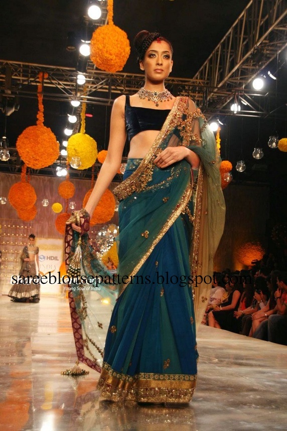 Checkout model displaying designer georgette sarees with embroidery work 