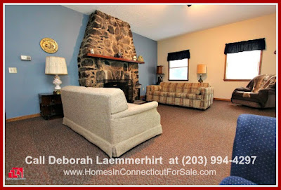 The expansive living room in this 4 bedroom home Candlewood lakefront home for sale can surely accommodate all your friends and loved ones.