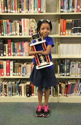 Anaya Ellick has no hands and uses her fore arms to write but she despite this she won a national handwriting competition