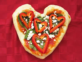 heart shaped red pepper personal pizza