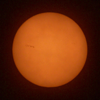 sunspot through clouds