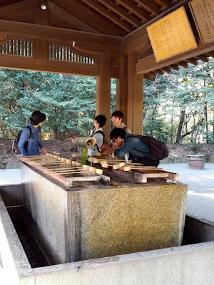 Cleansing ritual at Meiji Shrine Japan