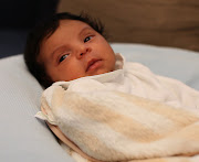 Beyonce & JayZ share photos of Baby Blue Ivy (baby blue )