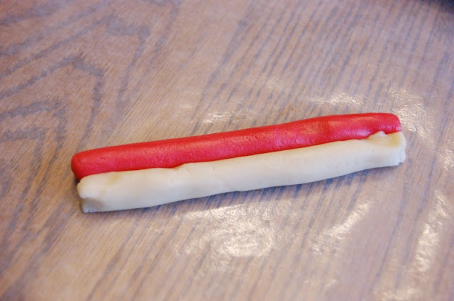 Making Candy Cane Cookies ~ two colors of almond sugar cookie dough twisted together! A fun & festive Christmas treat.  www.thekitchenismyplayground.com