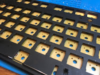 Photo of the Das Keyboard plate and PCB, with all of the switches removed