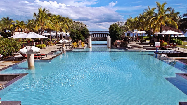 view of the two swimming pools and the sea at Crimson Resort and Spa in Mactan Cebu