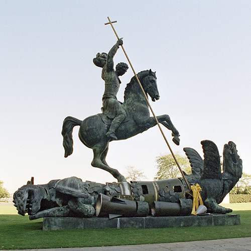 A sculpture depicting St. George the Victorious, striking the dragon, was created using fragments of the Soviet SS-20 rocket and the American nuclear rocket Pershing. UN Photo / Milton Grant