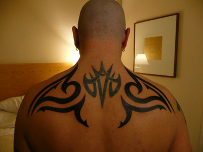 Upper back tattoos for men tribal