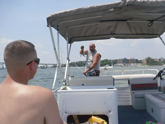 The requisite "King of the World" pose on a boat: