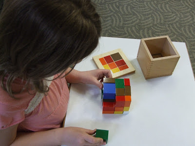 NAMC preparing montessori students for standardized testing girl with montessori math cube