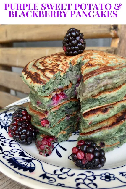 Cutting into purple sweet potato and blackberry pancakes.