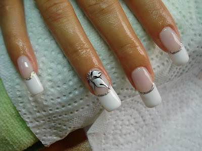 Elegant classical french manicure for wedding Sweet french nails with gold