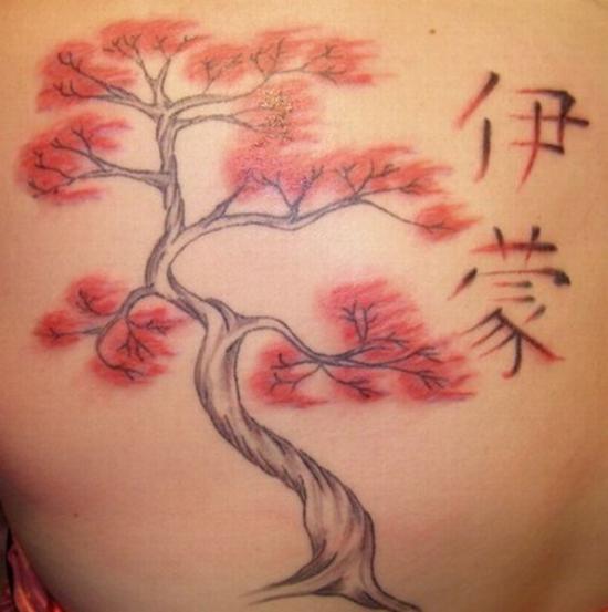 cherry blossom tree tattoo on back. hair the cherry blossom tree