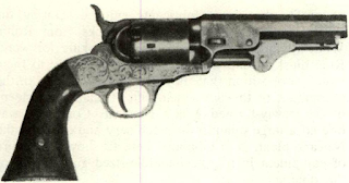 London Pistol Co. was Manhattan trade mark stamped on this flared grip .31 five shooter. Supplementary cylinder stop slots were for safety allowing capped cylinder to be locked between chambers with hammer down. Cast iron frames were often engraved.