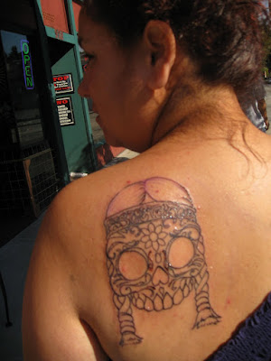 This is Jamie and her sugar skull tattoo inspired by her Mexican heritage 