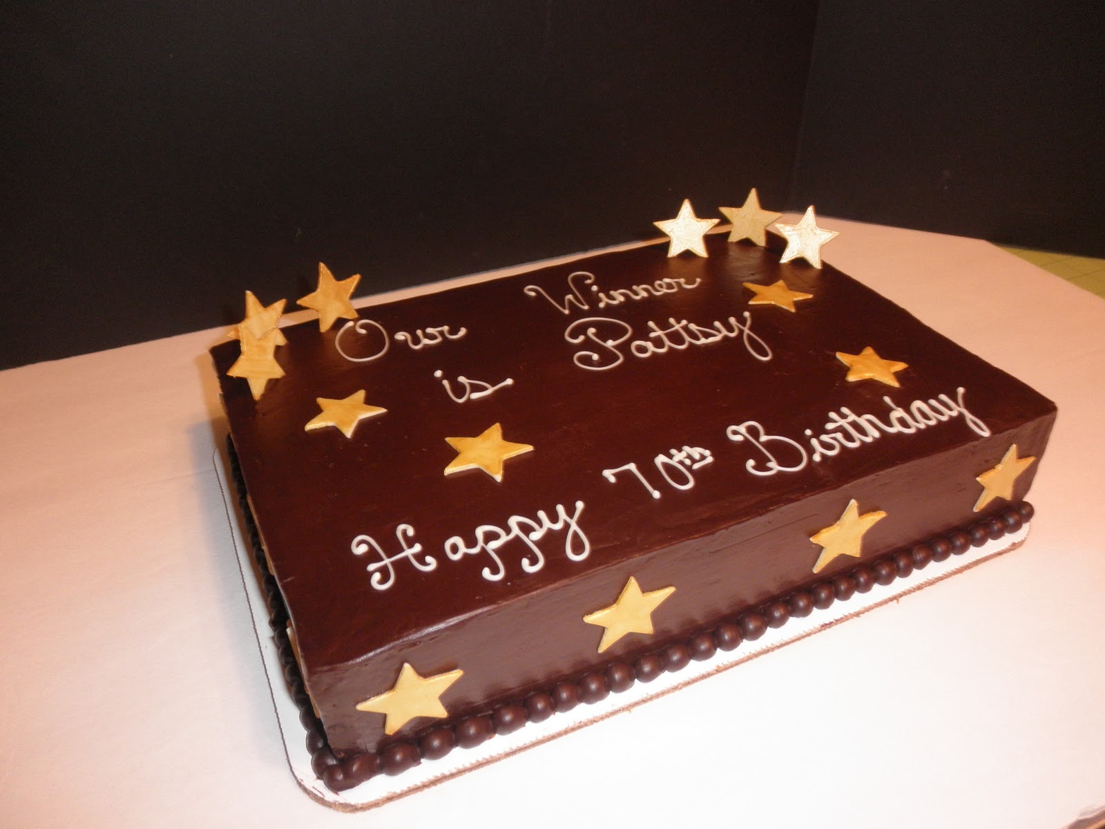 chocolate birthday cake images 70th Birthday Sheet cake. A personal winner cake with white chocolate 