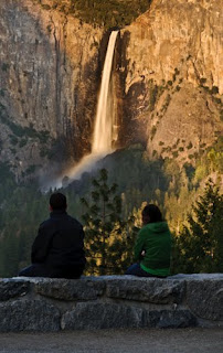 Couple looks at Bridalveil Fall from tunnel view