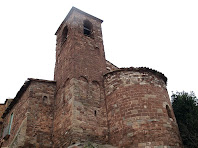 El campanar i l'absis de l'església de Sant Iscle i Santa Victòria de Bages