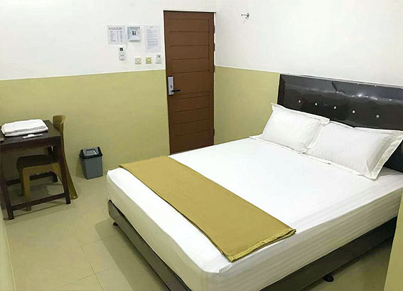 Single Bed Kamar Homy Inn & Cafe photo