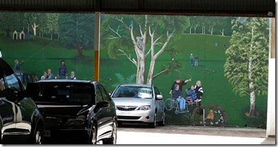 Wall art in parking lot of garage