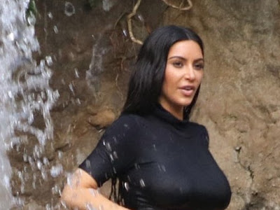 Kim K takes a dip in a waterfall while wearing sexy black bikini (photos) 