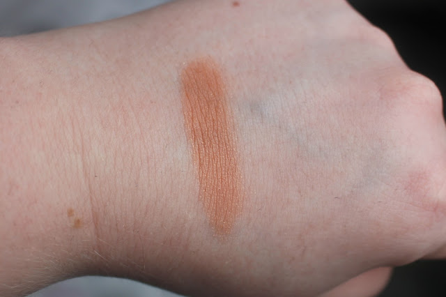 Photo of Swatch of Afterglow 8-hour Blush in Kinky from the Urban Decay Goodie Bag