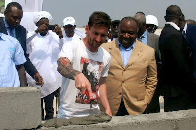 Messi lays brick at the Port-Gentil stadium,