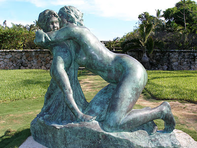 Bronze sculpture of mother and child at Versailles Gardens, Paradise Is., Bahamas.