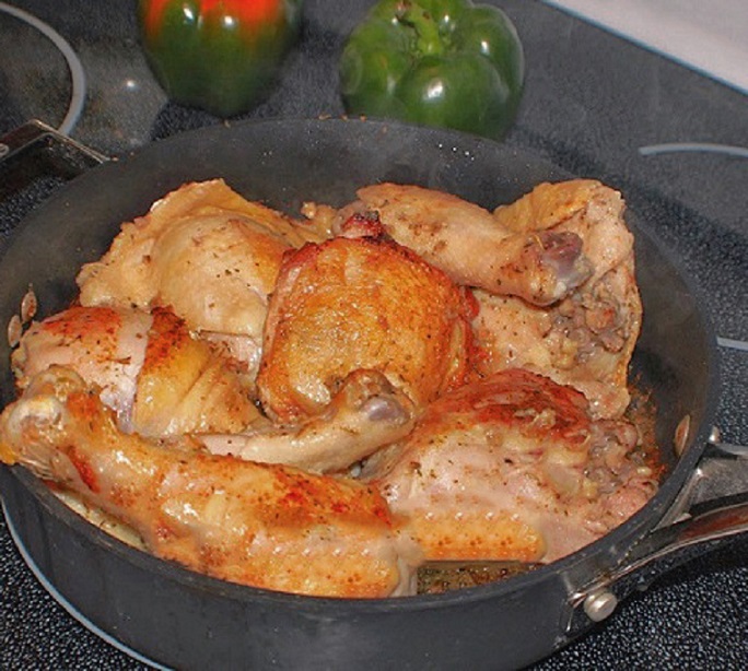 seasoned sauteed chicken browned in a pan