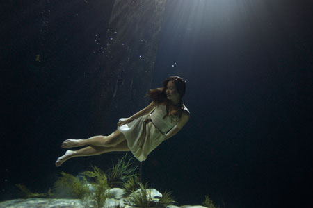 Usually seen reporting from movie premiers for her monthly CNN film programme, The Screening Room, the singer-turned-presenter spent all day in a water tank at Pinewood Studios because she wanted to see how underwater scenes were filmed. Wearing a dress worthy of the red carpet, the 30-year-old mother was monitored by a stunt team and diving instructor who last worked with Angelina Jolie. Miss Klass said: "I found the stunt a lot more exhausting and physical than I expected it to be. I was wearing three weight belts to keep me on the sea bed and I had to keep equalising, yet try and look gentile. "My dress kept floating up over my head, my hair kept getting in my mouth and my eyes went red in the water. Being underwater was emotionally really liberating though.