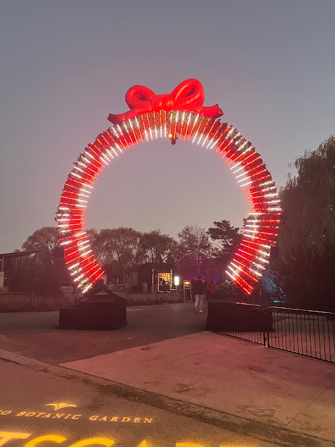 A vibrant wreath heralds entry to Lightscape!
