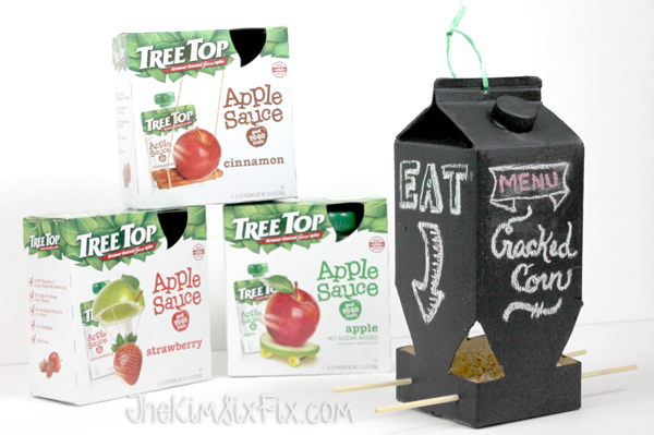 Tree top applesauce birdfeeder