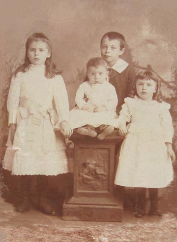 Anna on left, William Valentine standing behind baby John and sister Bess.