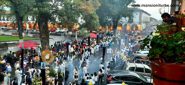 Corpus Christin parade passing in front of Hotel Mansion Iturbe in Patzcuaro