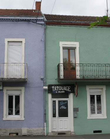 A Tatoo Shop in the row of shops in Montceau 