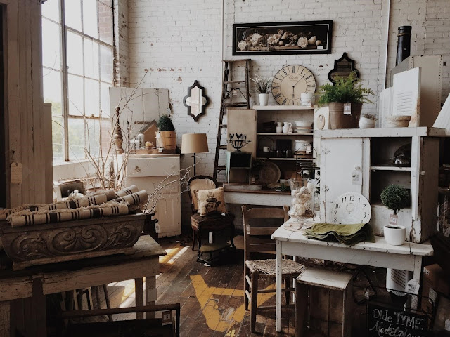 A storage room filled with antique furniture
