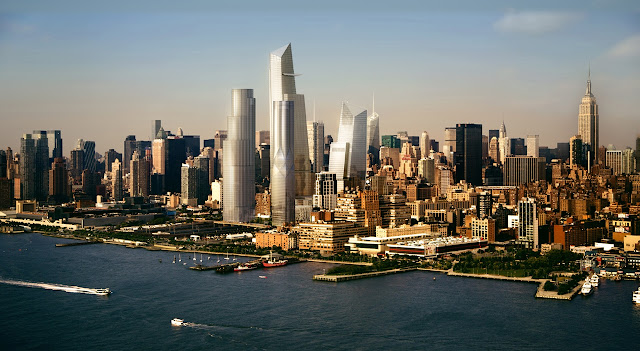 Picture of four new buildings in the phase one development of Hudson Yards as seen from the air above the Hudson river