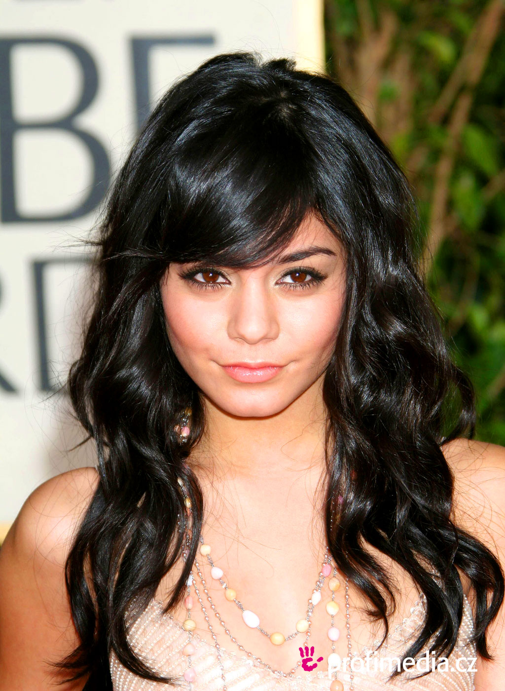 Celebrity Vanessa Hudgens Messy Curly Hairstyle Pictures title=