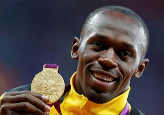 Bolt claims 100m gold at World Championships 2015