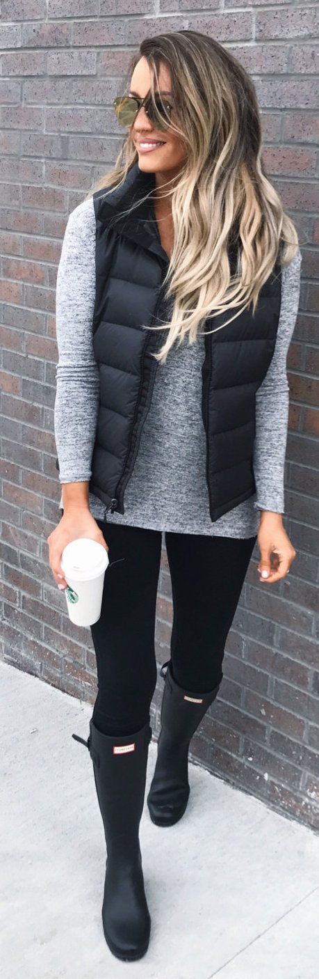 how to style a black vest / grey sweater + black skinnies + high boots