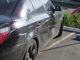 Key scratches on BMW 545i before painting at Almost Everything Auto Body