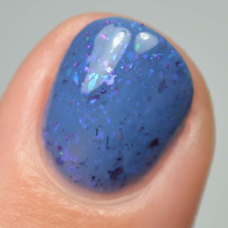 blue nail polish with flakies