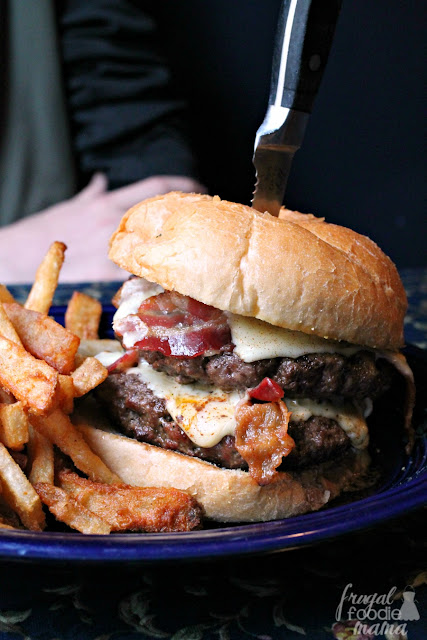 The Brandt's Gut Buster bacon cheeseburger from The Pub consists of two 8-ounce burgers stacked with lots of cheese and crispy bacon!