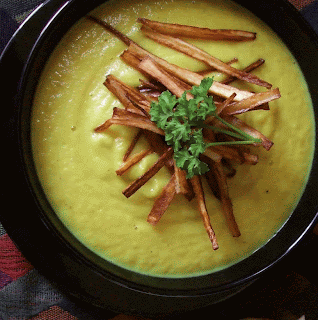 Cream of parsnip soup with lemon and ginger and crisp allumettes