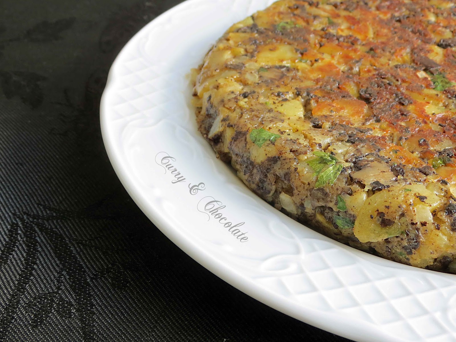 Tortilla de patatas y morcilla de arroz de Burgos