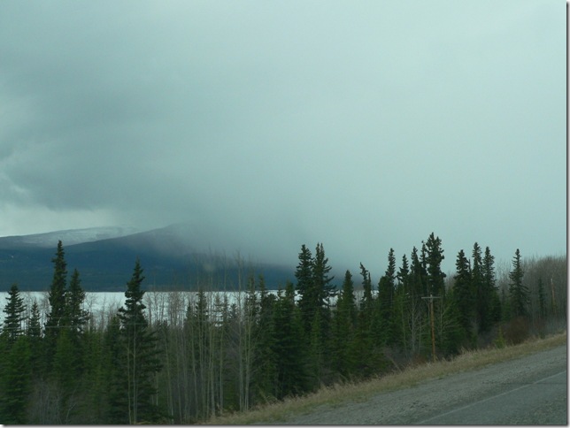 The rain moving in over Teslin Lake, YT