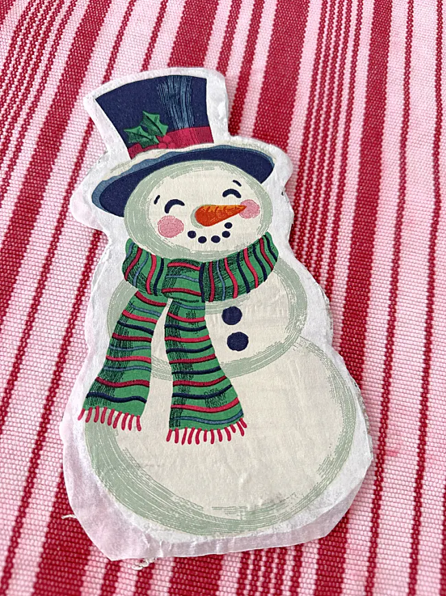 snowman decoupaged to cardboard