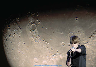 Wallpaper of Justin Bieber in Concert at Moon Light Radiance wallpaper for the fans