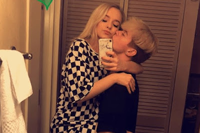 Zoe LaVerne's boyfriend Cody kissing her